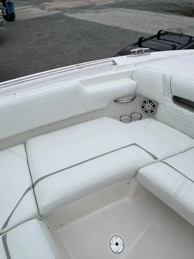  Yacht Photos Pics 2026 Tiara Yachts 34 LS interior with white seating and cup holders.