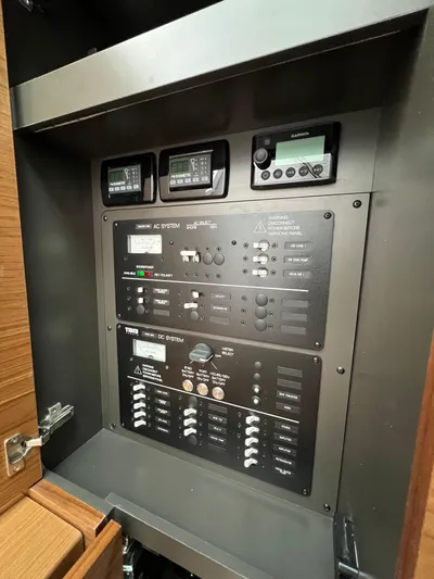  Yacht Photos Pics Electrical control panel inside 2026 Tiara Yachts 34 LS, featuring AC and DC systems.