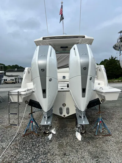  Yacht Photos Pics 2026 Tiara Yachts 34 LS with dual outboard engines on display.