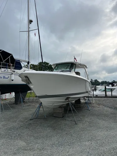  Yacht Photos Pics 2026 Tiara Yachts 34 LS boat on stands in a marina setting.