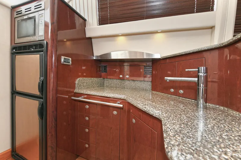 Atlantic Dream Yacht Photos Pics Luxurious kitchen on a 2008 Sea Ray 44 Sedan Bridge yacht.