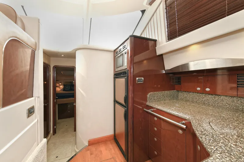 Atlantic Dream Yacht Photos Pics Interior of 2008 Sea Ray 44 Sedan Bridge with modern kitchen.