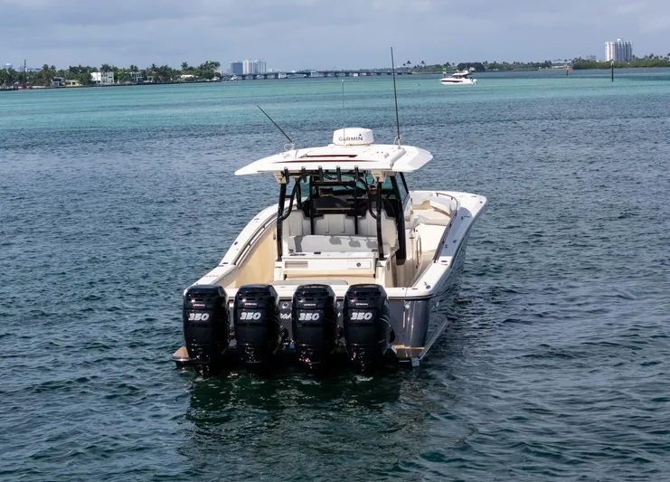  Yacht Photos Pics 2020 Scout 380 LXF boat with four engines on open water.
