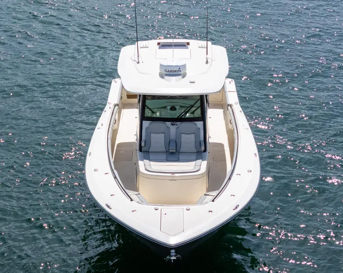  Yacht Photos Pics 2020 Scout 380 LXF boat on water, aerial view, sunny day.