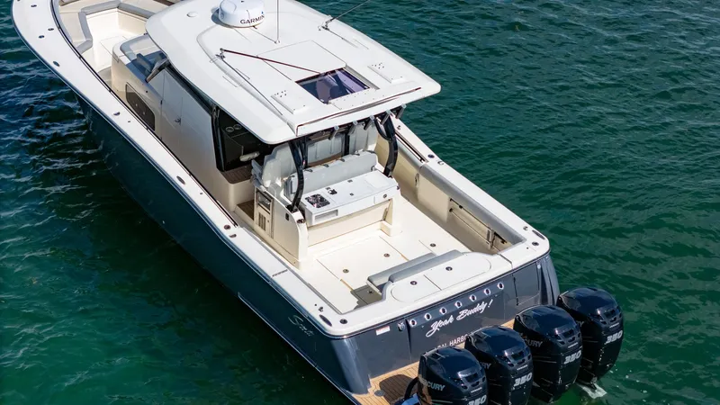  Yacht Photos Pics 2020 Scout 380 LXF boat with four outboard engines on water.