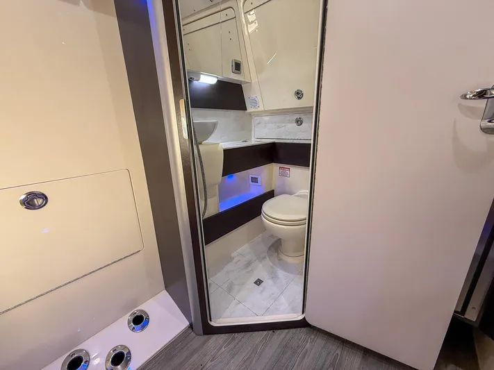  Yacht Photos Pics 2020 Scout 380 LXF boat interior bathroom with modern fixtures and sleek design.