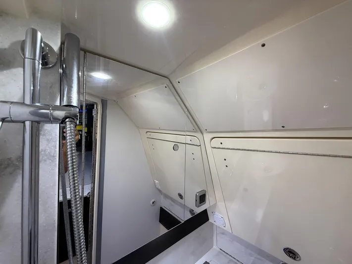  Yacht Photos Pics Interior of 2020 Scout 380 LXF boat, featuring modern shower and sleek design.