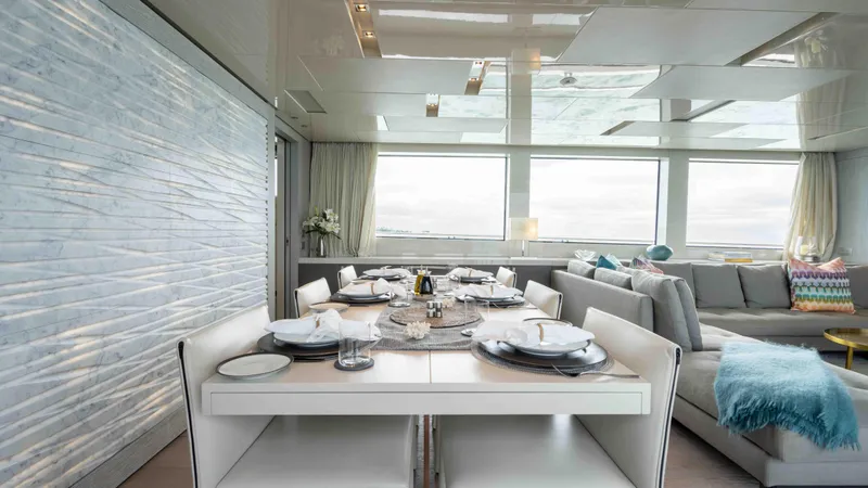 Honey Pot Yacht Photos Pics Luxurious dining area on 2019 Sanlorenzo SL 106 yacht with elegant table setting.