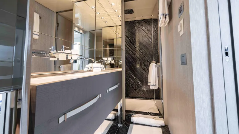 Honey Pot Yacht Photos Pics Luxurious bathroom on a 2019 Sanlorenzo SL 106 yacht with modern fixtures.