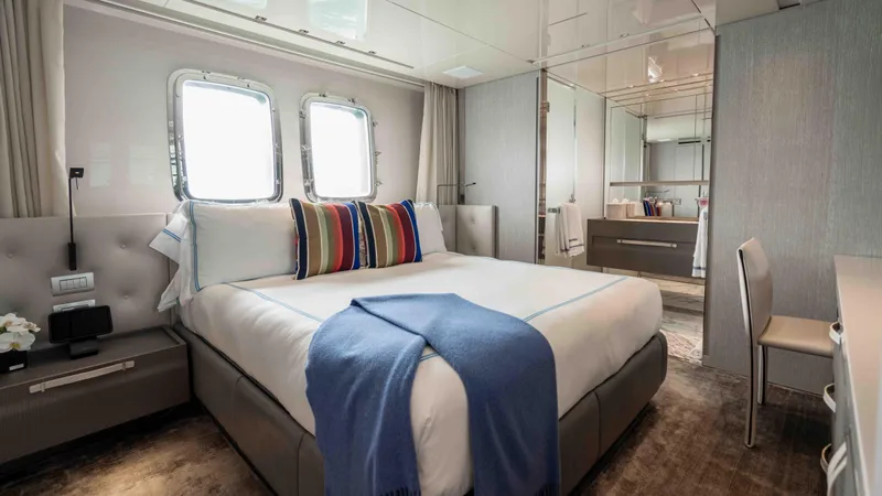 Honey Pot Yacht Photos Pics Luxurious bedroom interior of 2019 Sanlorenzo SL 106 yacht with modern decor.