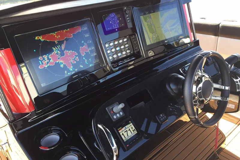  Yacht Photos Pics 2017 Mystic Powerboats M4200 dashboard with advanced navigation and control systems.