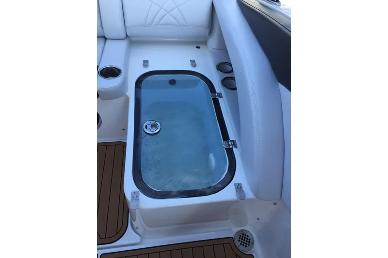  Yacht Photos Pics Livewell on 2017 Mystic Powerboats M4200, featuring white seating and teak flooring.