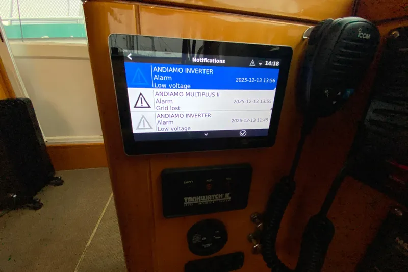  Yacht Photos Pics Control panel with alarm notifications on a Compass 57, 2001 model boat.