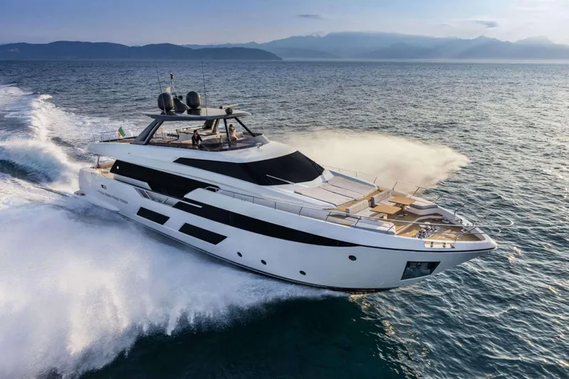  Yacht Photos Pics Luxurious 2019 Ferretti Yachts 920 cruising on open sea, showcasing sleek design and elegance.