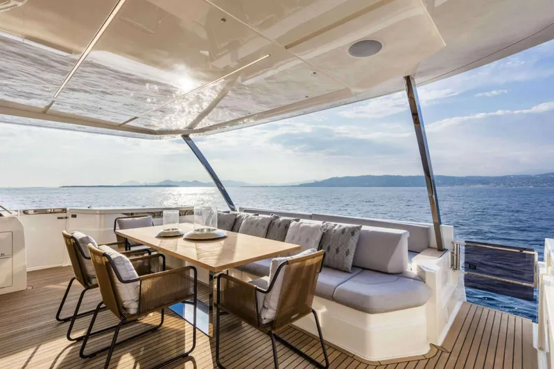  Yacht Photos Pics Luxurious 2019 Ferretti Yachts 920 deck with elegant seating and ocean view.