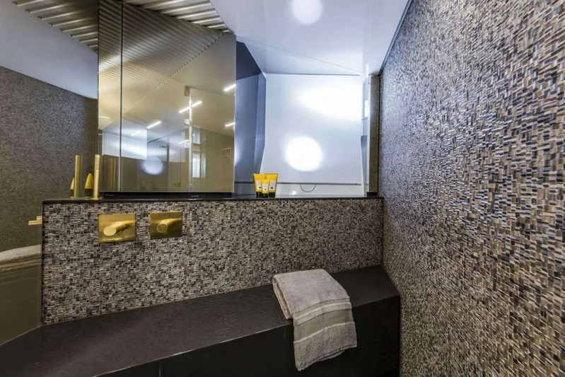  Yacht Photos Pics Luxurious bathroom in 2019 Ferretti Yachts 920, featuring modern design and elegant fixtures.