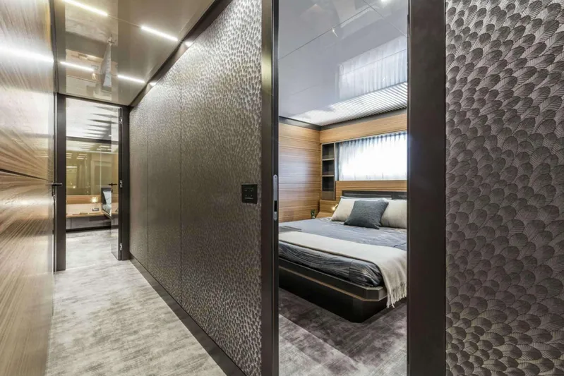  Yacht Photos Pics Luxurious bedroom interior of 2019 Ferretti Yachts 920, featuring modern design and elegant decor.