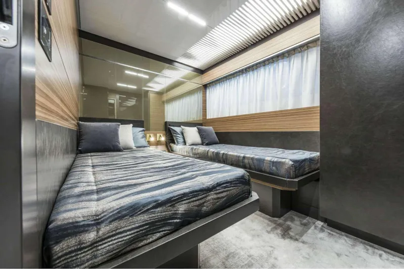  Yacht Photos Pics Luxurious twin bedroom in 2019 Ferretti Yachts 920, featuring modern design and elegant decor.