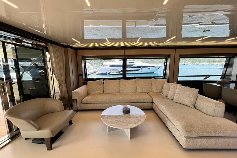  Yacht Photos Pics Luxurious interior of 2019 Ferretti Yachts 920 with elegant seating and sea view.