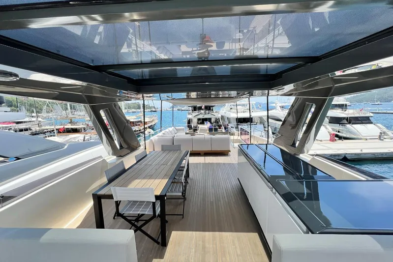  Yacht Photos Pics Luxurious 2019 Ferretti Yachts 920 interior with elegant dining area and marina view.