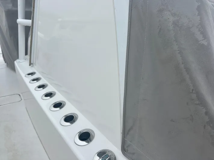 Fly Girl Yacht Photos Pics 2020 Invincible 39 Open Fisherman boat with rod holders and protective cover.