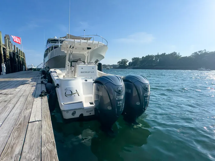 Lil Oa Yacht Photos Pics 2022 Sea Fox 288 Commander docked with dual Yamaha 250 engines, sunny day.