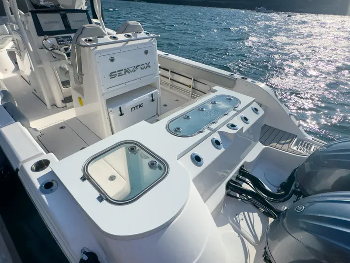 Lil Oa Yacht Photos Pics 2022 Sea Fox 288 Commander boat interior with dual engines and Garmin navigation.