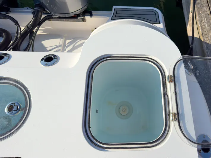 Lil Oa Yacht Photos Pics 2022 Sea Fox 288 Commander boat livewell and storage compartments.