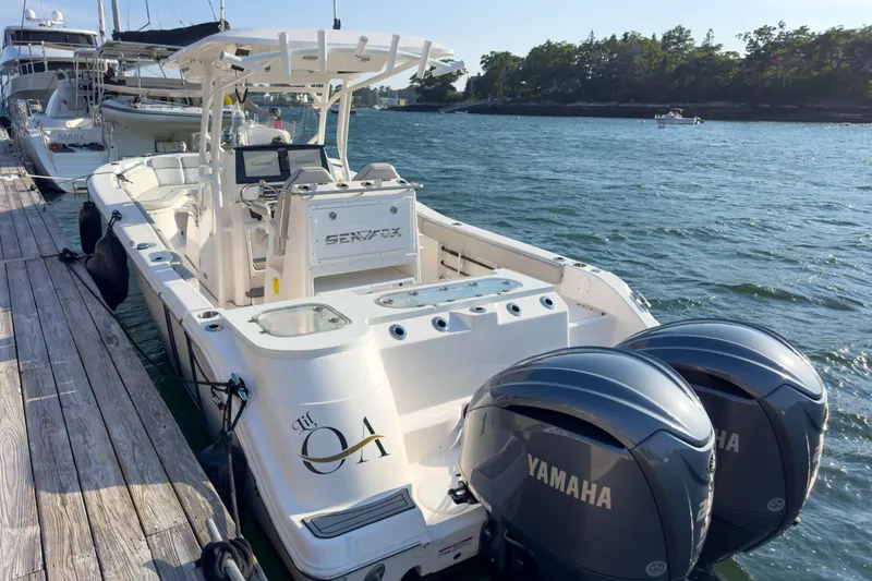 Lil Oa Yacht Photos Pics 2022 Sea Fox 288 Commander boat docked with twin Yamaha engines.