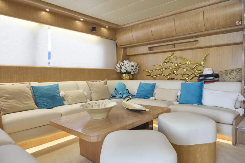  Yacht Photos Pics Luxurious Maiora 20 yacht interior, 2002 model, featuring elegant seating and decorative accents.