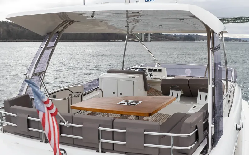 Little Nellie Yacht Photos Pics Luxurious 2017 Prestige 560 yacht with spacious deck and seating on open water.