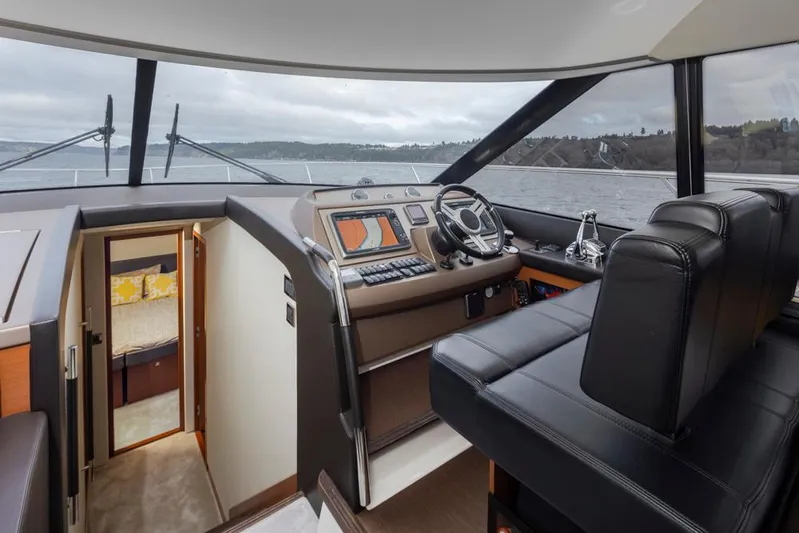 Little Nellie Yacht Photos Pics Luxurious 2017 Prestige 560 yacht interior with modern helm and panoramic views.