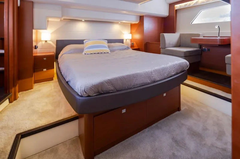 Little Nellie Yacht Photos Pics Luxurious bedroom interior of 2017 Prestige 560 yacht with modern design.