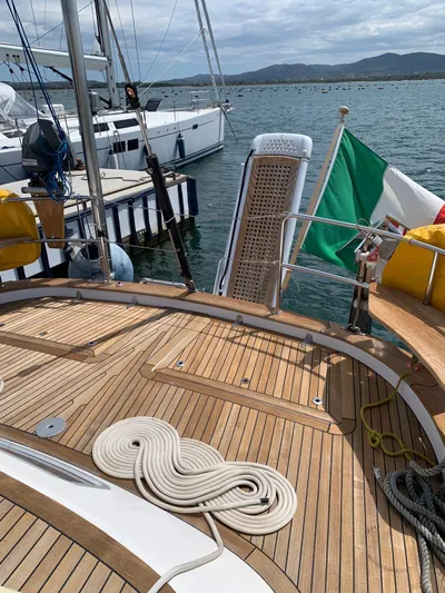  Yacht Photos Pics Deck of 2006 Hallberg-Rassy 48 MK yacht with coiled rope and Italian flag.