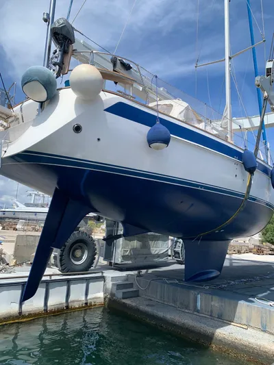  Yacht Photos Pics 2006 Hallberg-Rassy 48 MK sailboat in dry dock, showcasing hull and keel design.