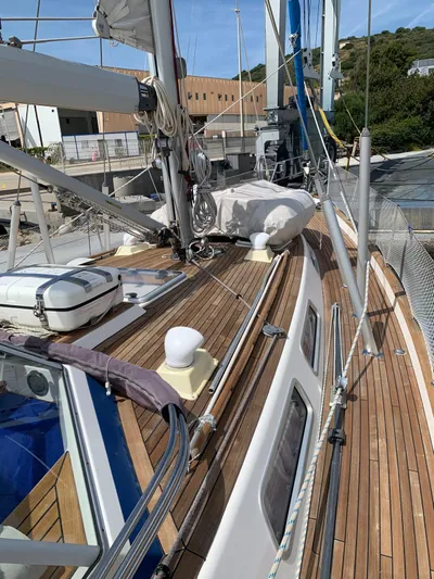  Yacht Photos Pics Sailboat deck of 2006 Hallberg-Rassy 48 MK with wooden finish and rigging details.