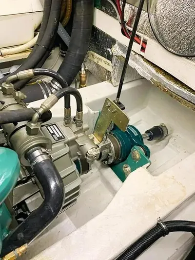  Yacht Photos Pics Engine compartment of a 2006 Hallberg-Rassy 48 MK sailboat, showcasing mechanical components.