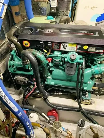  Yacht Photos Pics Engine compartment of a 2006 Hallberg-Rassy 48 MK sailboat, featuring a Volvo Penta engine.