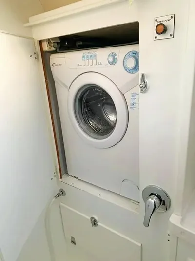  Yacht Photos Pics Washing machine in 2006 Hallberg-Rassy 48 MK yacht interior.