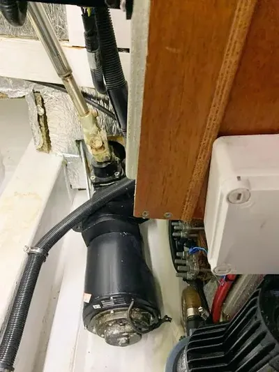  Yacht Photos Pics Engine compartment of a 2006 Hallberg-Rassy 48 MK sailboat, showing mechanical components.