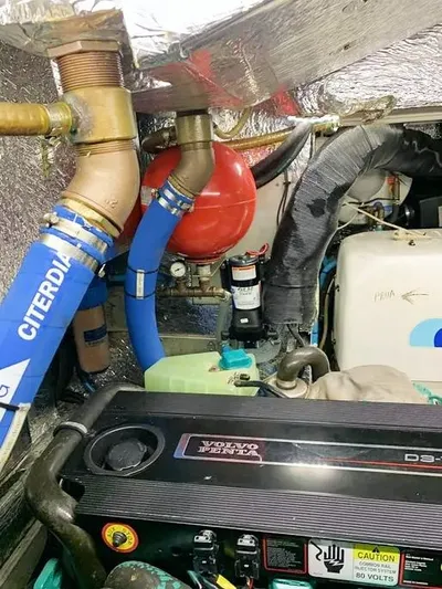  Yacht Photos Pics Engine room of 2006 Hallberg-Rassy 48 MK yacht with Volvo Penta D3 engine.