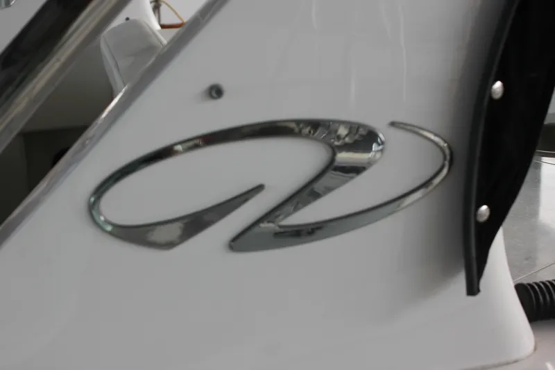  Yacht Photos Pics 2021 Regal 33 XO boat logo on white surface.