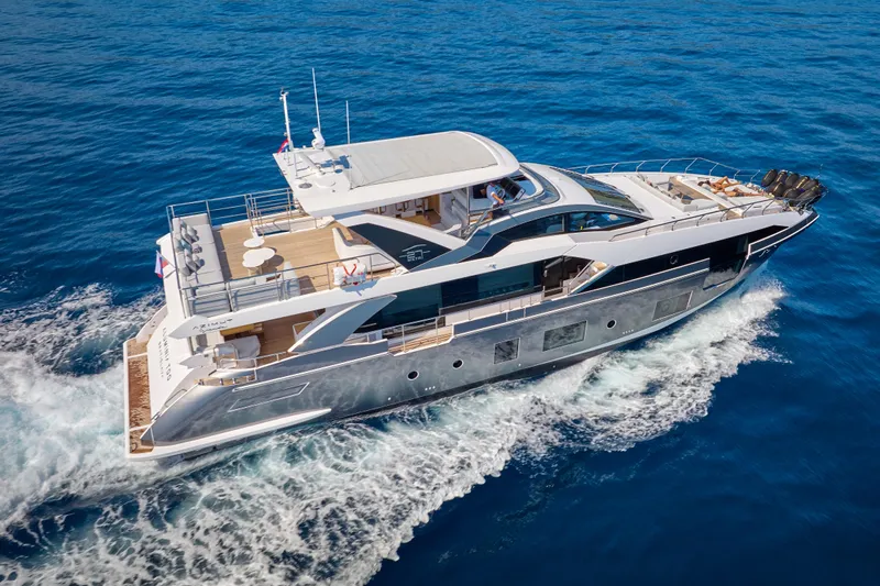 Aluminia Too Yacht Photos Pics 2024 Azimut Grande 27M luxury yacht cruising on open sea.