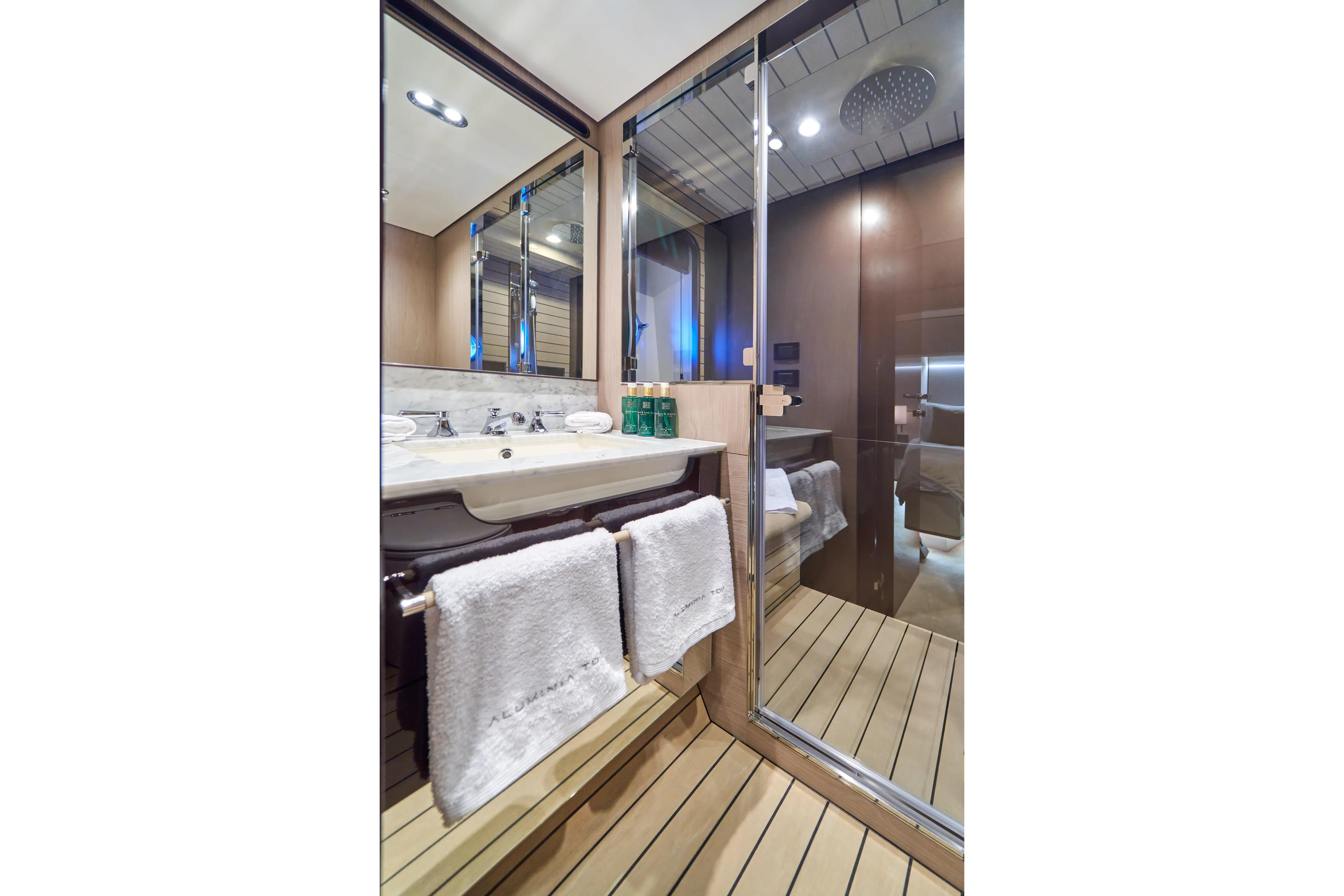Aluminia Too Yacht Photos Pics Luxurious bathroom in 2024 Azimut Grande 27M yacht with modern fixtures and elegant design.