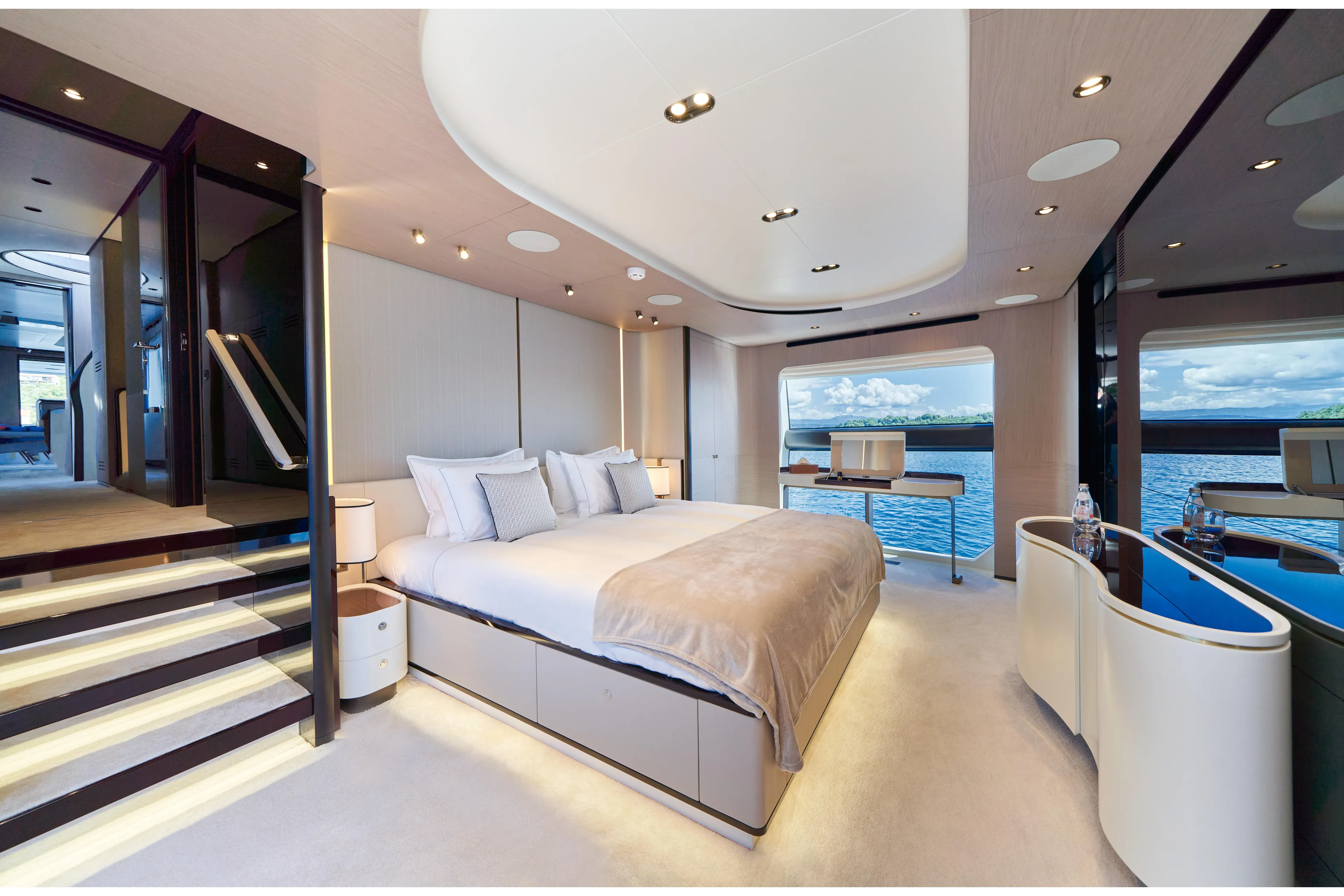 Aluminia Too Yacht Photos Pics Luxurious bedroom interior of 2024 Azimut Grande 27M yacht with ocean view.
