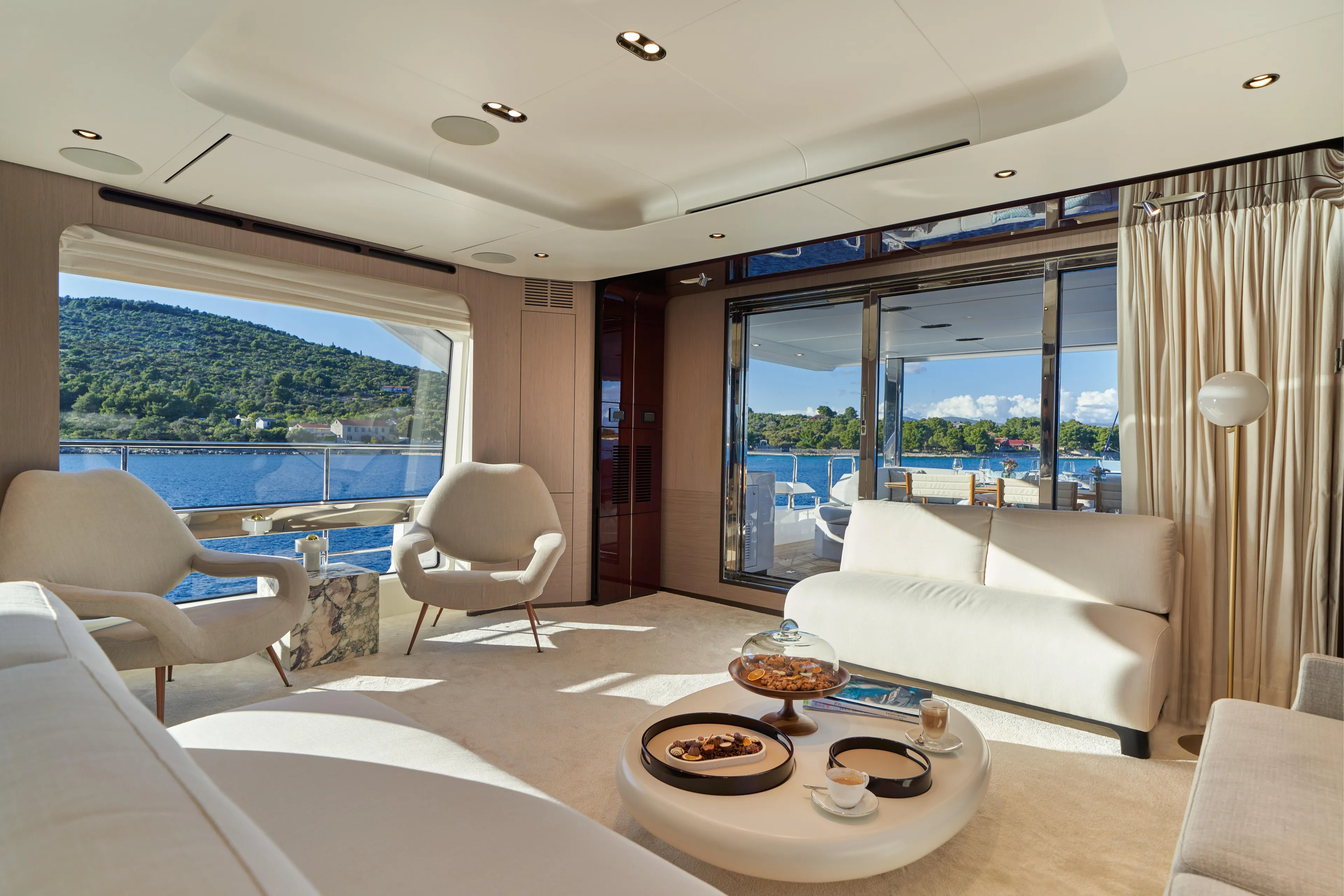 Aluminia Too Yacht Photos Pics Luxurious interior of 2024 Azimut Grande 27M yacht with scenic ocean view.