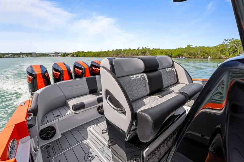  Yacht Photos Pics 2026 Nor-Tech 390 Sport Center Console with quad engines, sleek seating, and modern design.