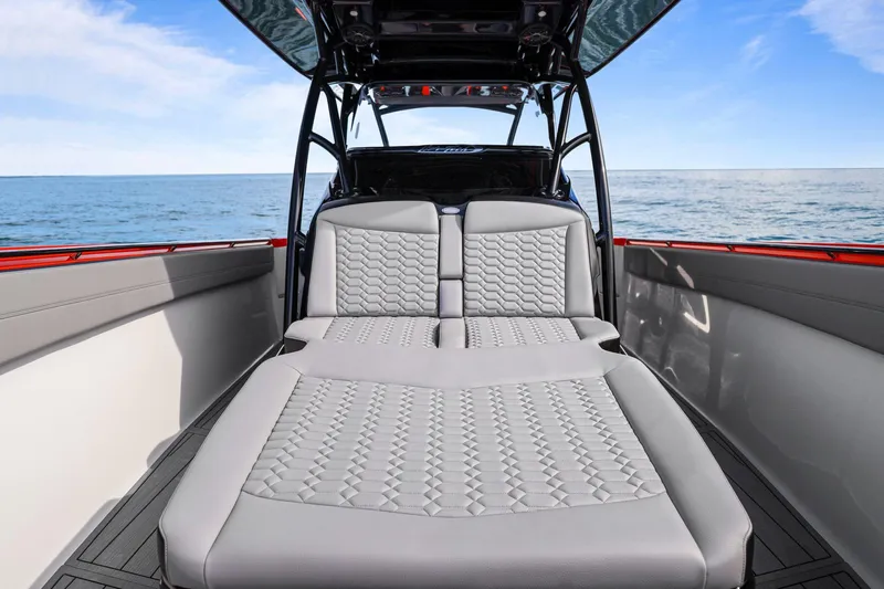  Yacht Photos Pics 2026 Nor-Tech 390 Sport Center Console with luxurious seating, ocean view backdrop.