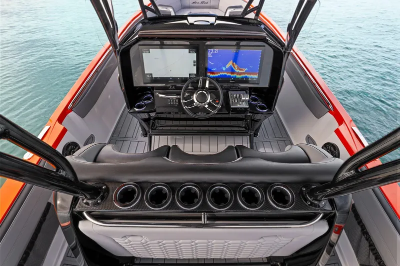  Yacht Photos Pics 2026 Nor-Tech 390 Sport Center Console helm with advanced navigation displays and sleek design.