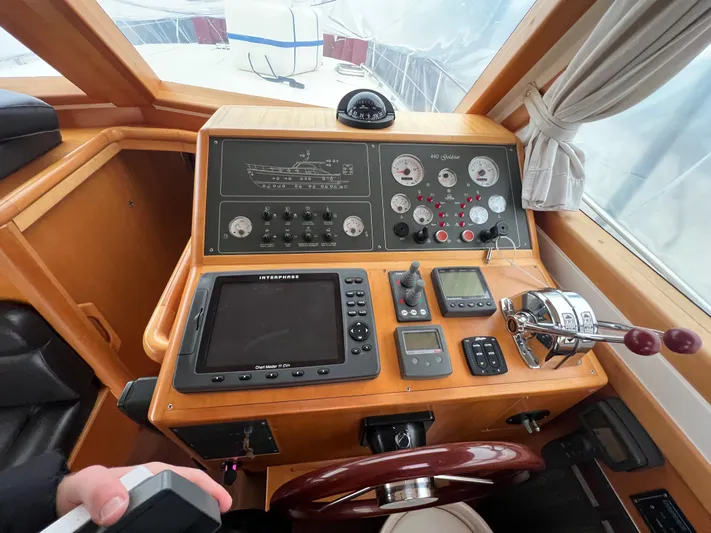  Yacht Photos Pics Cockpit of 2007 Cantieri Estensi Goldstar 440 with navigation instruments and controls.
